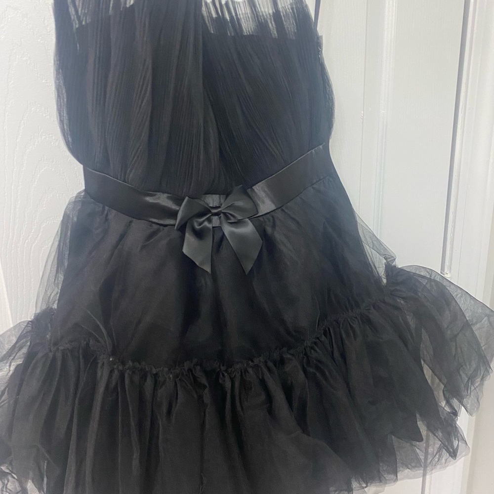 Flirty midi dress. Never worn. Prom, birthday or dinner dress. Zipper.